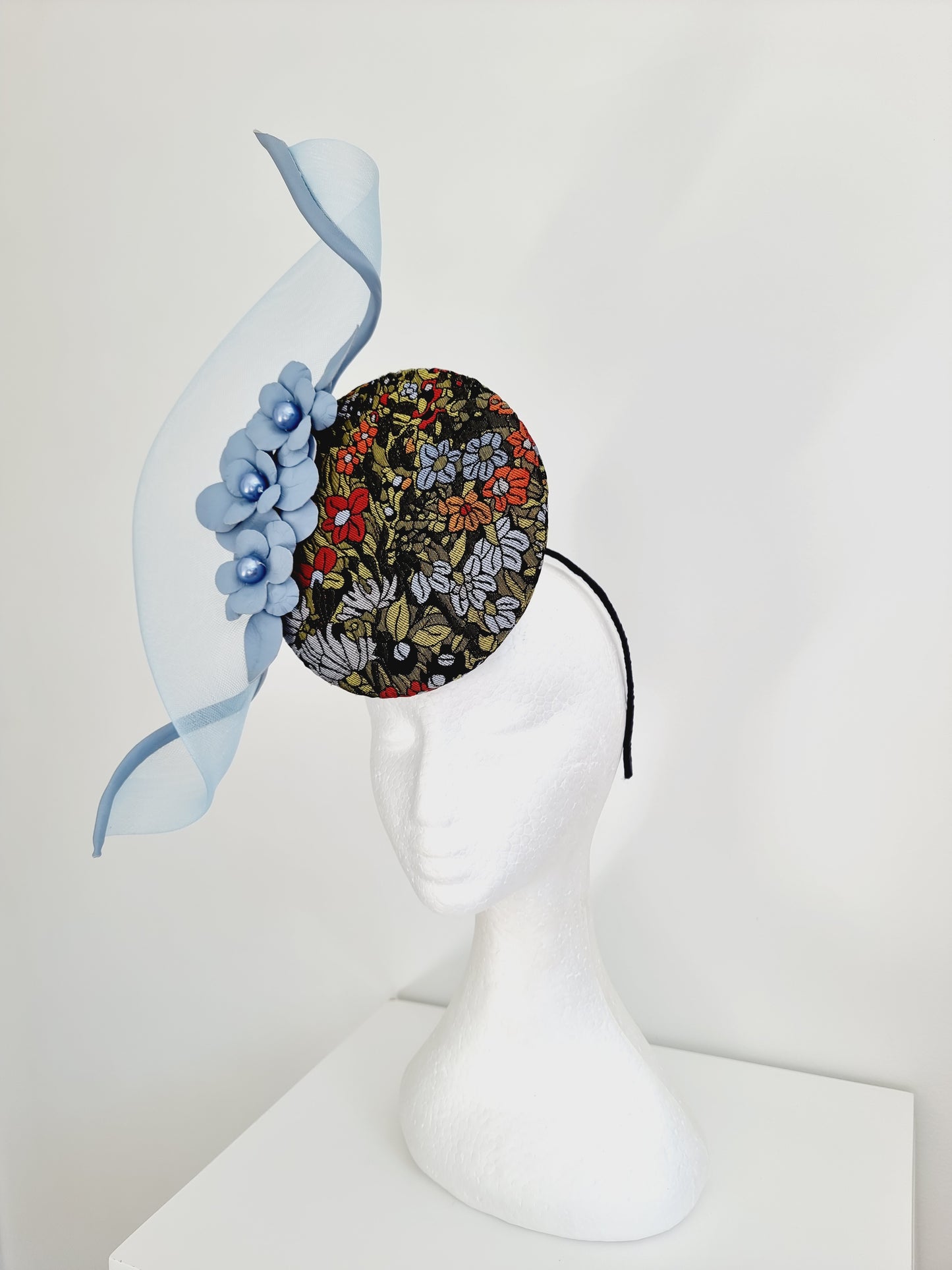 Miss Fabia. Womens Powder Blue flower percher headband fascinator