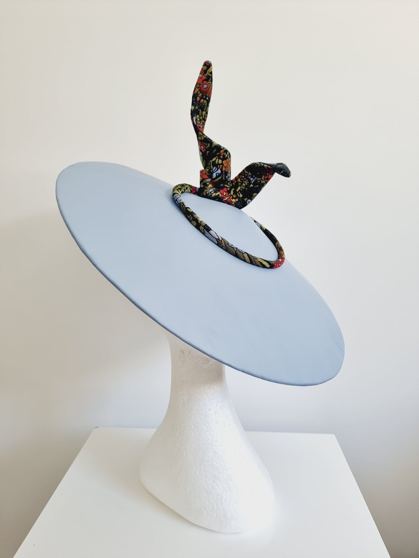 Miss Caspian. Womens Powder blue leather coolie hat with brocade trim