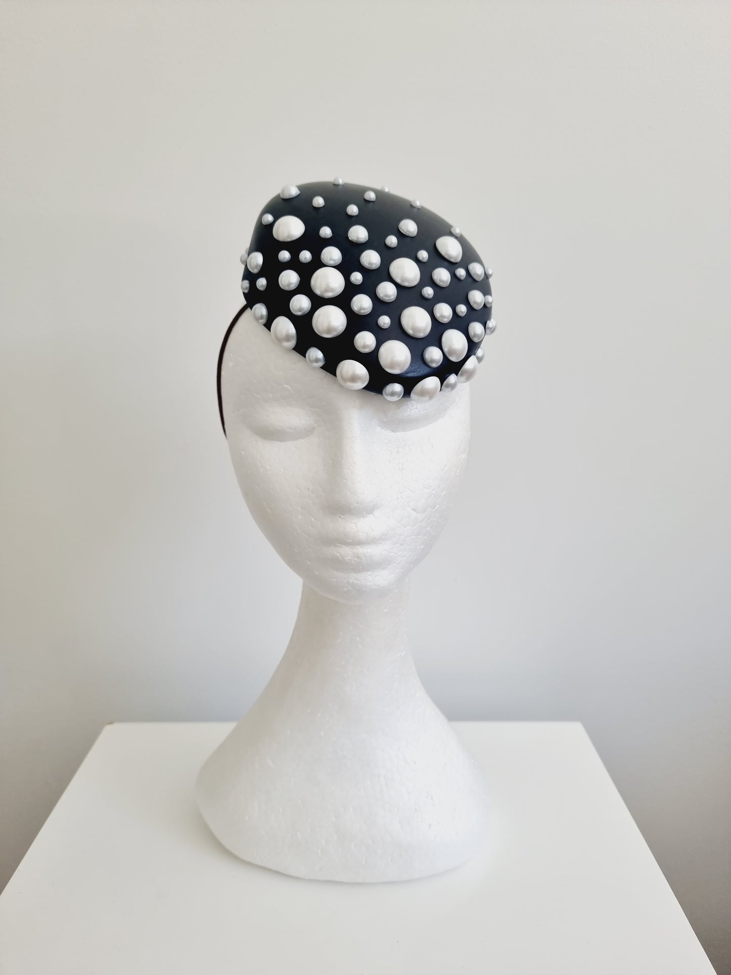 Miss Kefford. Womens Black slanted pillbox fascinator with pearls