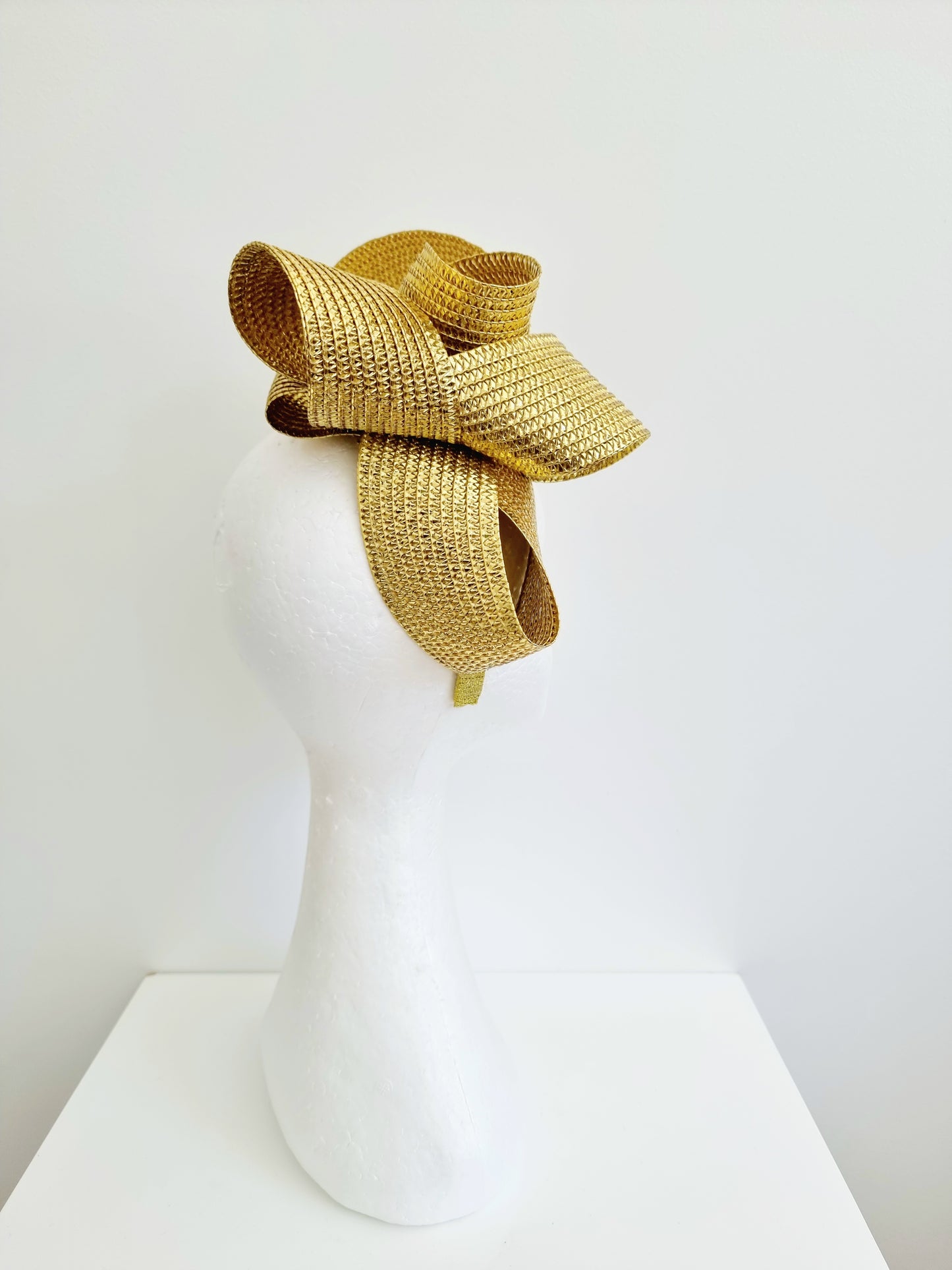 Miss Samantha. Womens braided loop fascinator in metallic gold