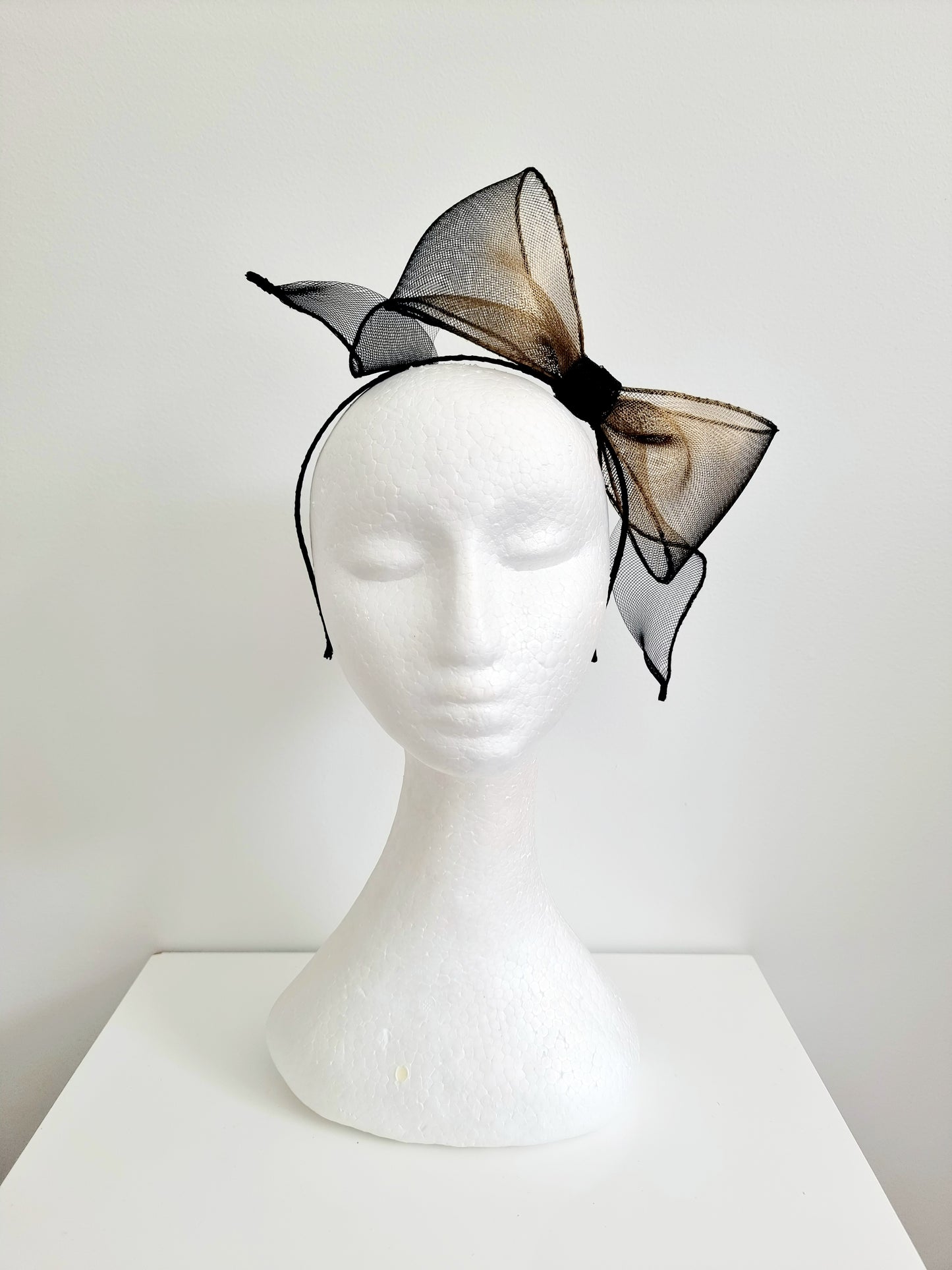 Miss Idoya. Womens black and old gold ombre bow and tails