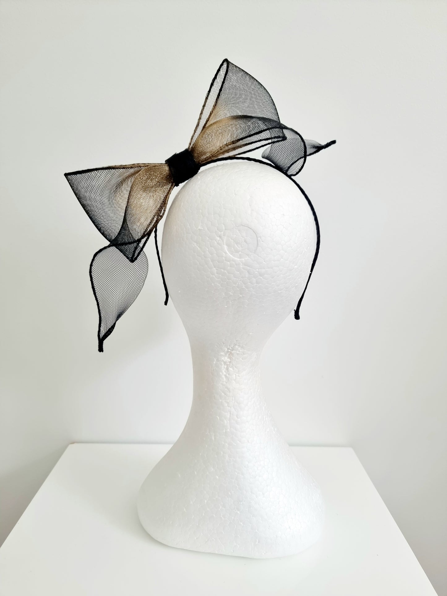 Miss Idoya. Womens black and old gold ombre bow and tails