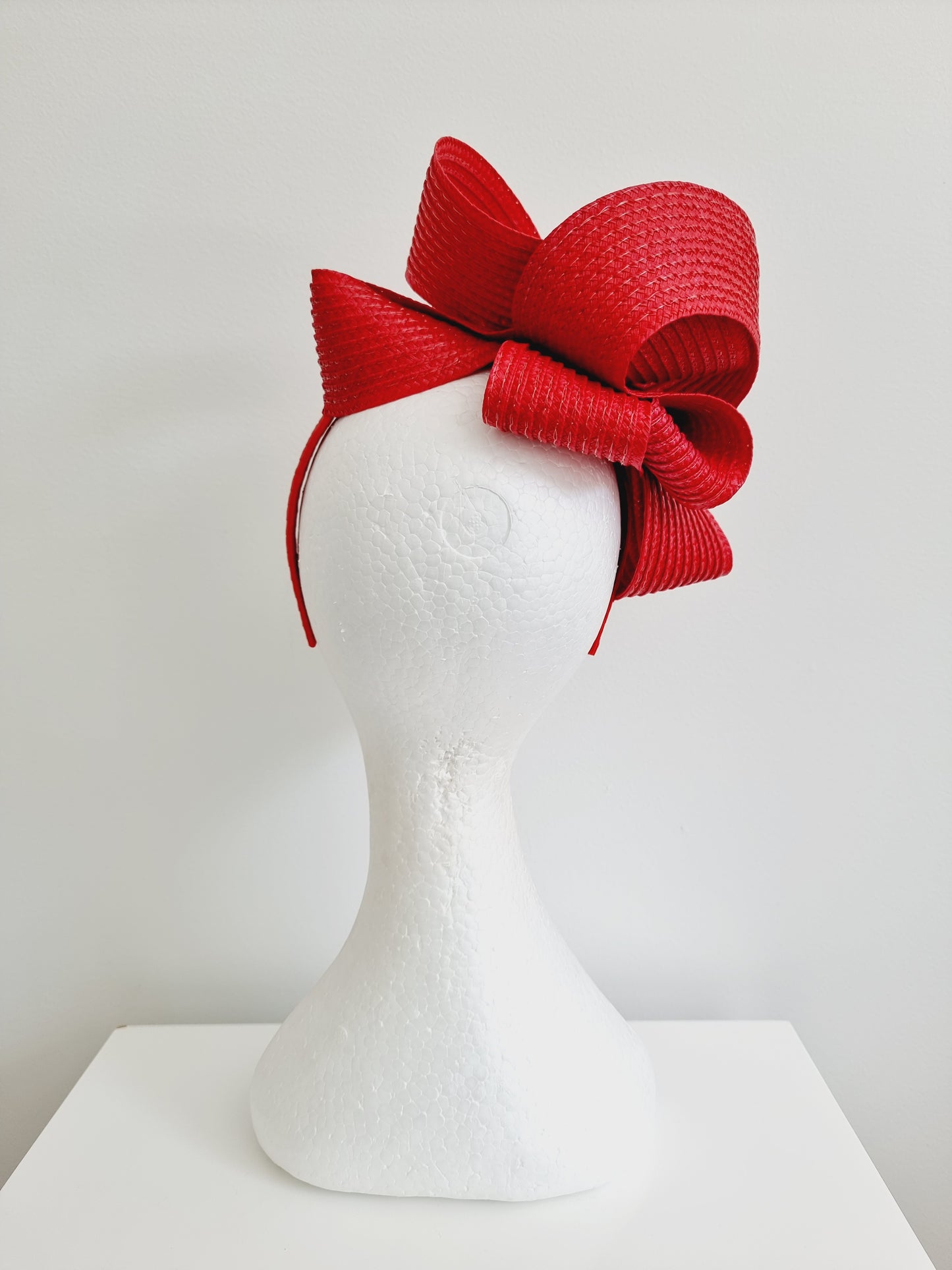 Miss Samantha. Womens braided loop fascinator in Red