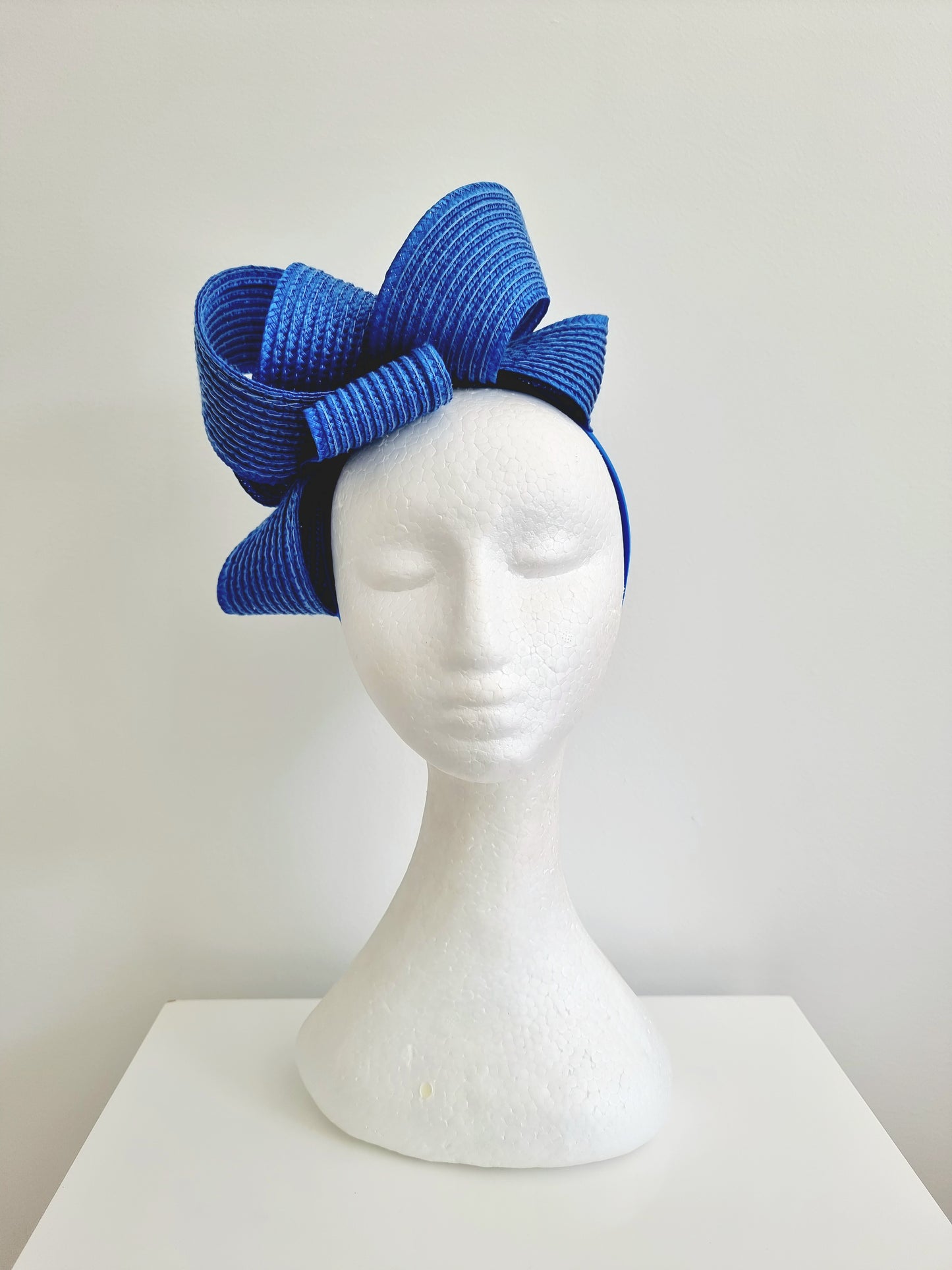 Miss Samantha. Womens braided loop fascinator in Ocean Blue