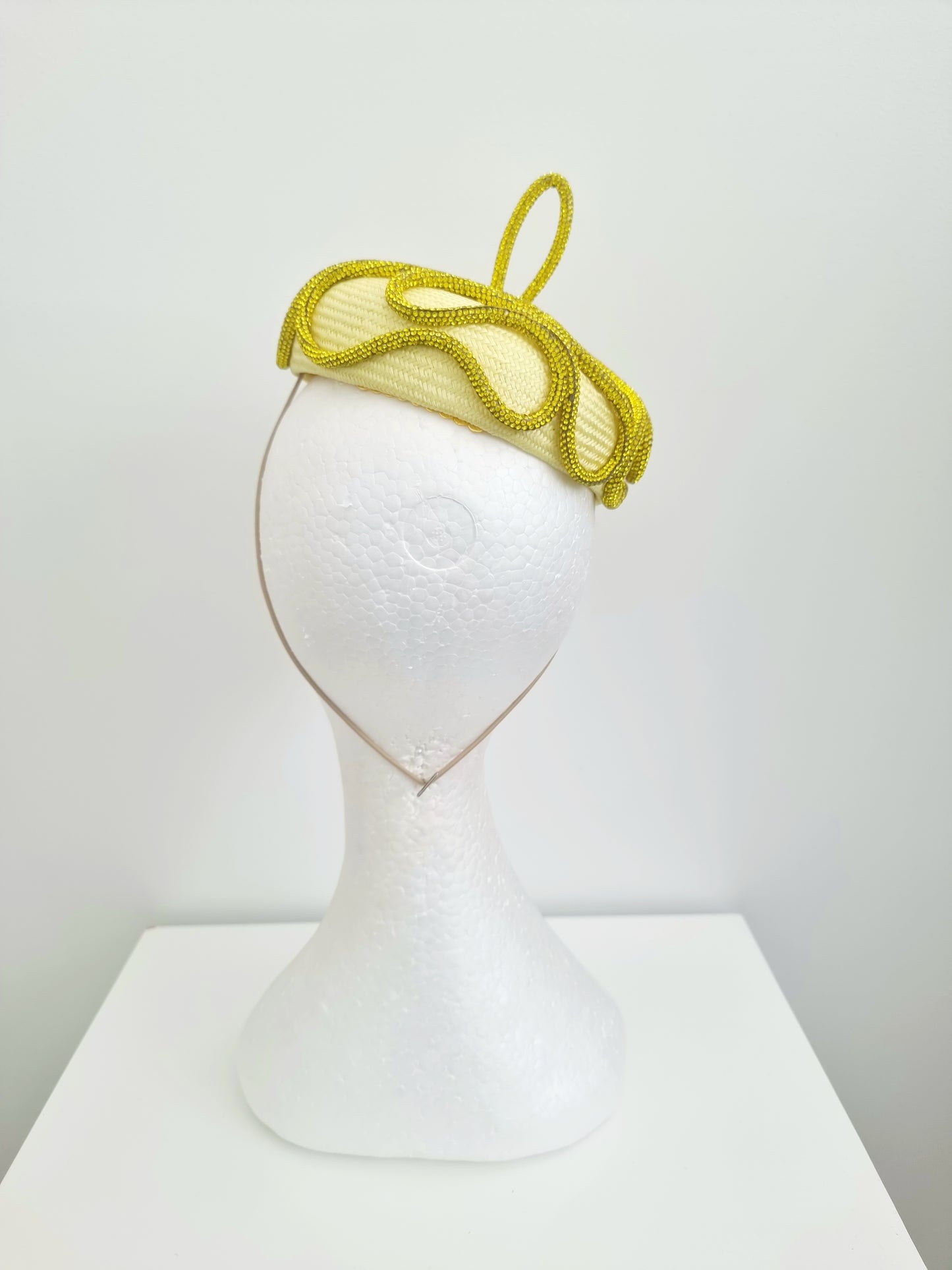 Miss Margot. Womens yellow button fascinator with rhinestones