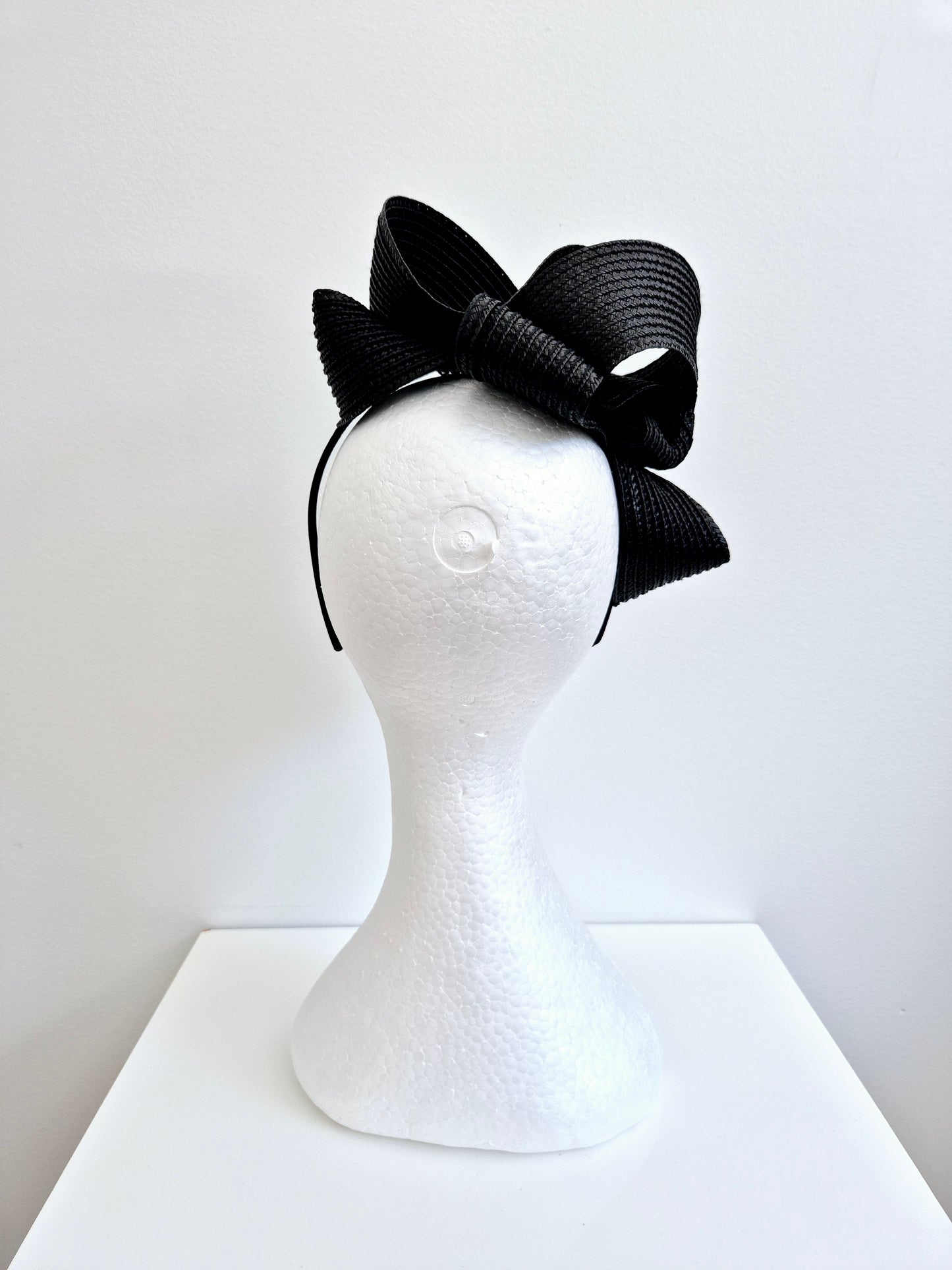 Miss Samantha. Womens braided loop fascinator in Black