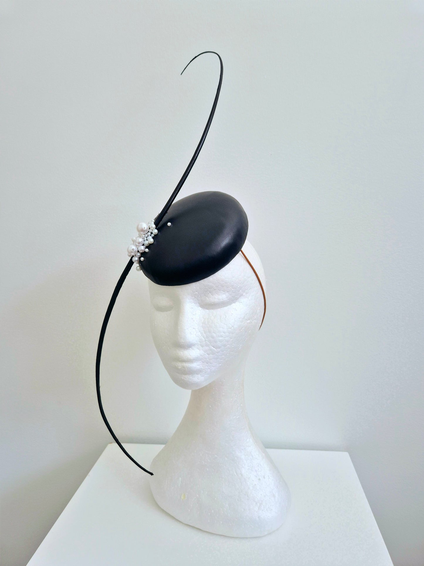 Miss On the Dot.  Womens Black leather button fascinator with quills and pearls