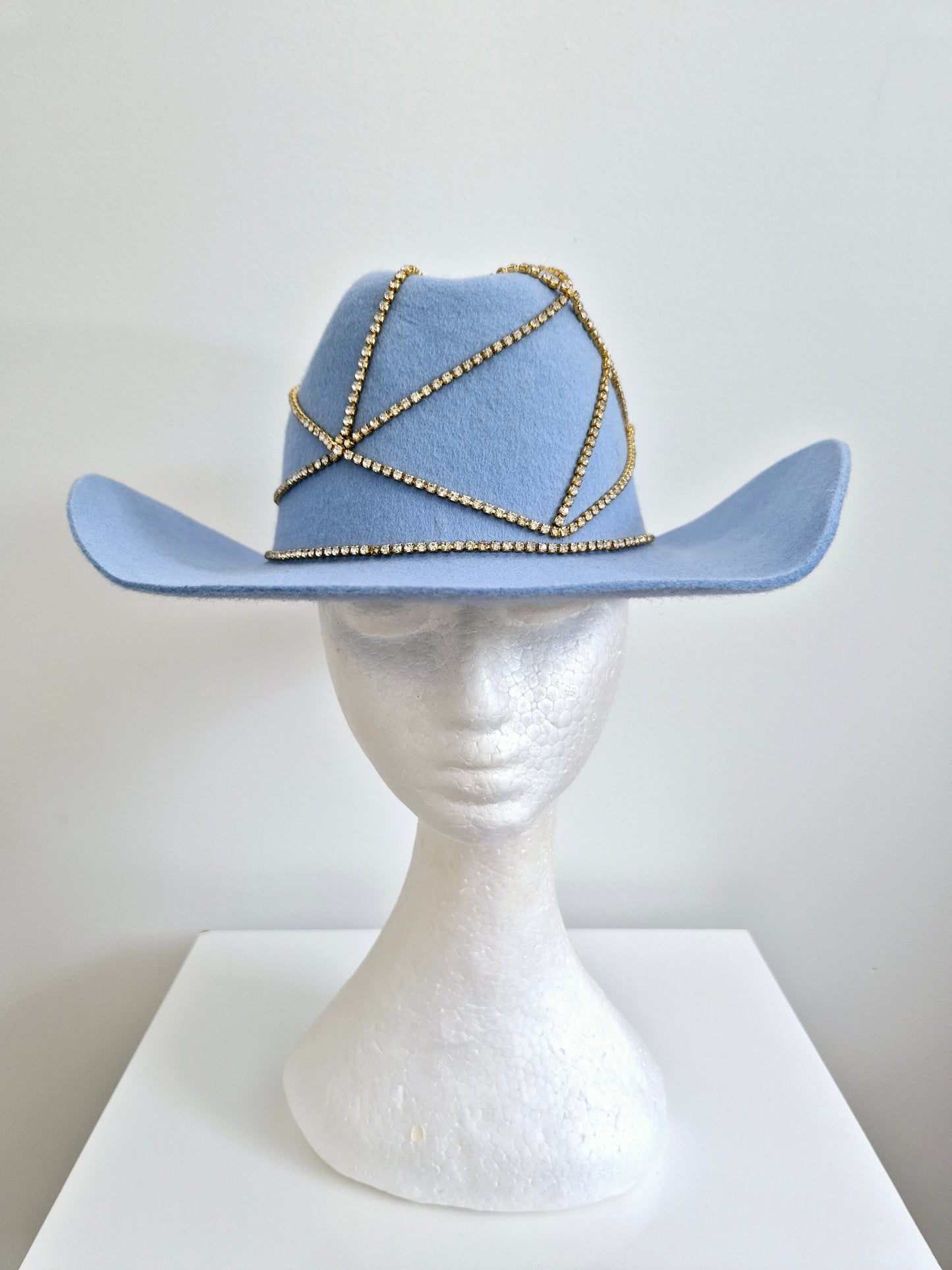 Miss Rhinestone cowgirl. Powder blue felt hat with rhinestone detail