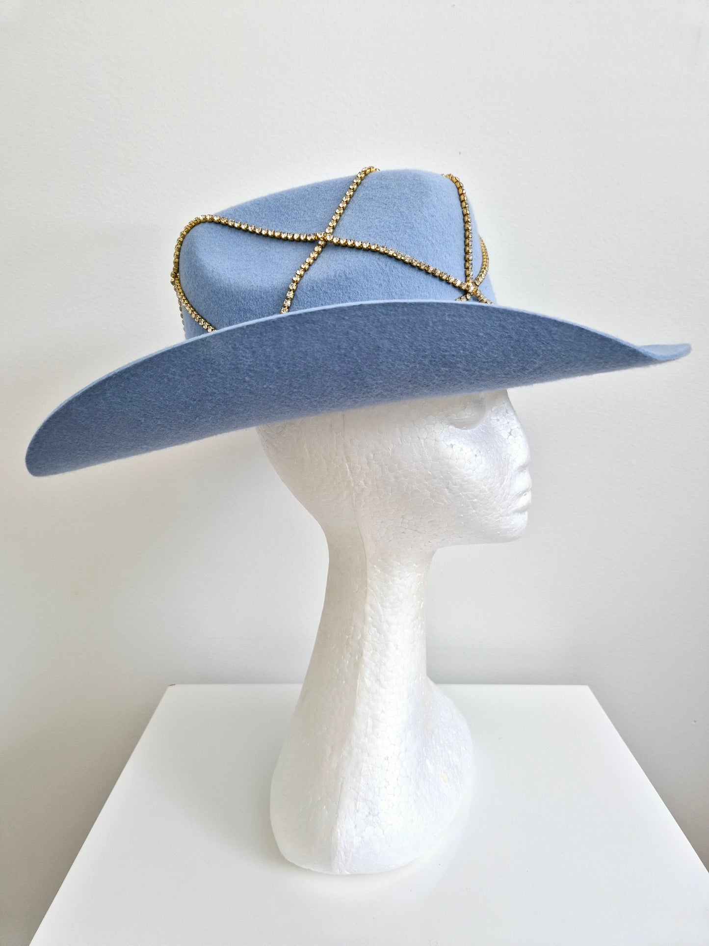 Miss Rhinestone cowgirl. Powder blue felt hat with rhinestone detail