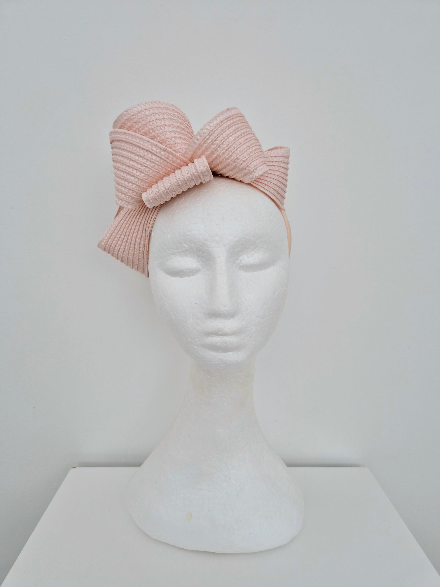 Miss Samantha. Womens braided loop fascinator in Dusty Pink