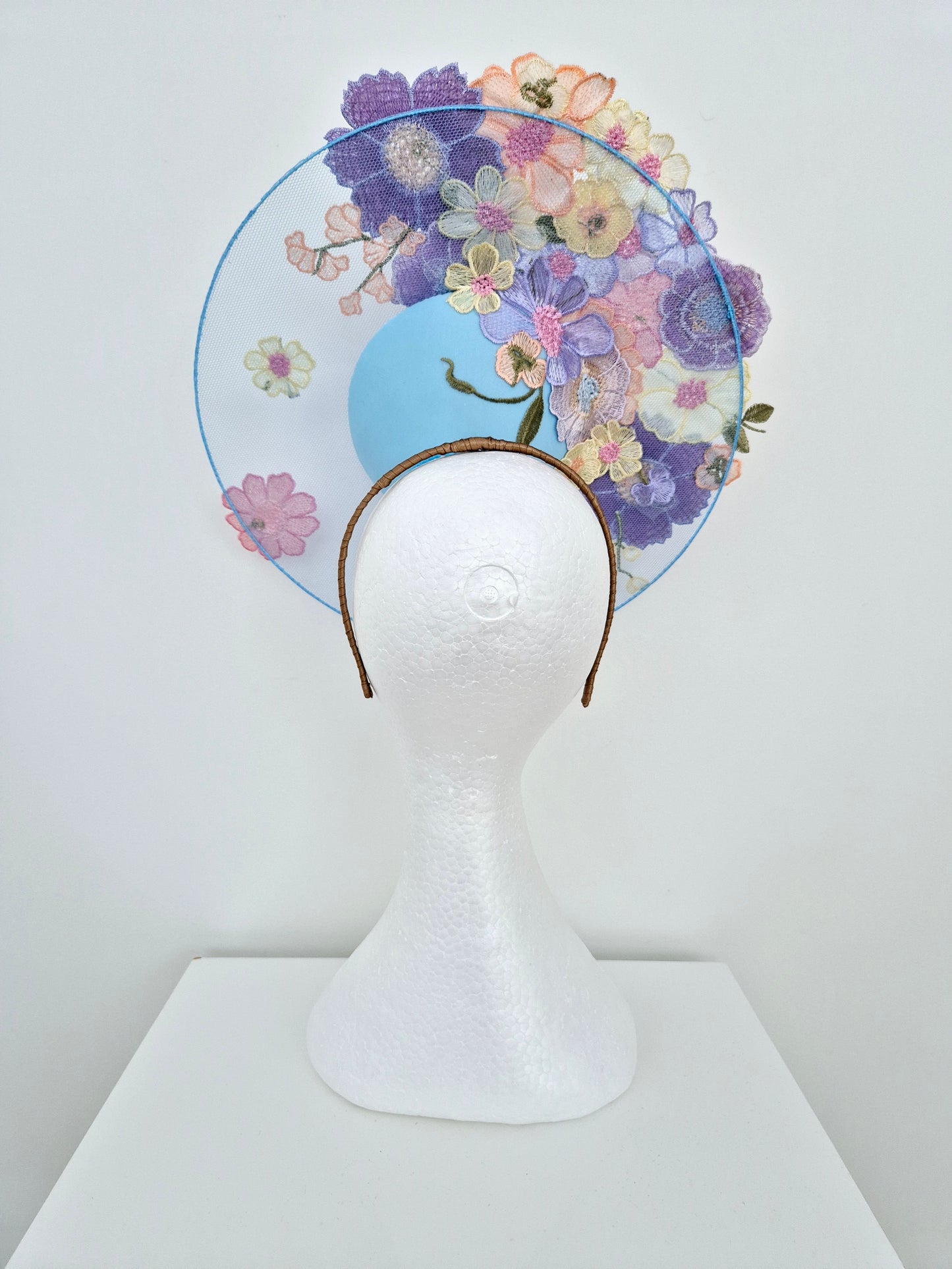 Miss Whimsical. Womens Light Blue satellite percher headband fascinator with pastel multi 3D flowers