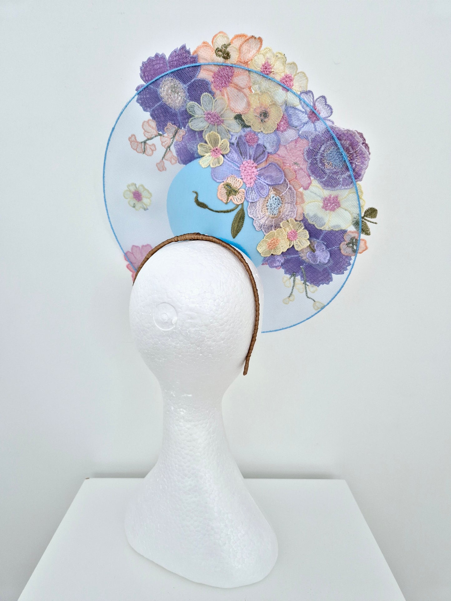 Miss Whimsical. Womens Light Blue satellite percher headband fascinator with pastel multi 3D flowers