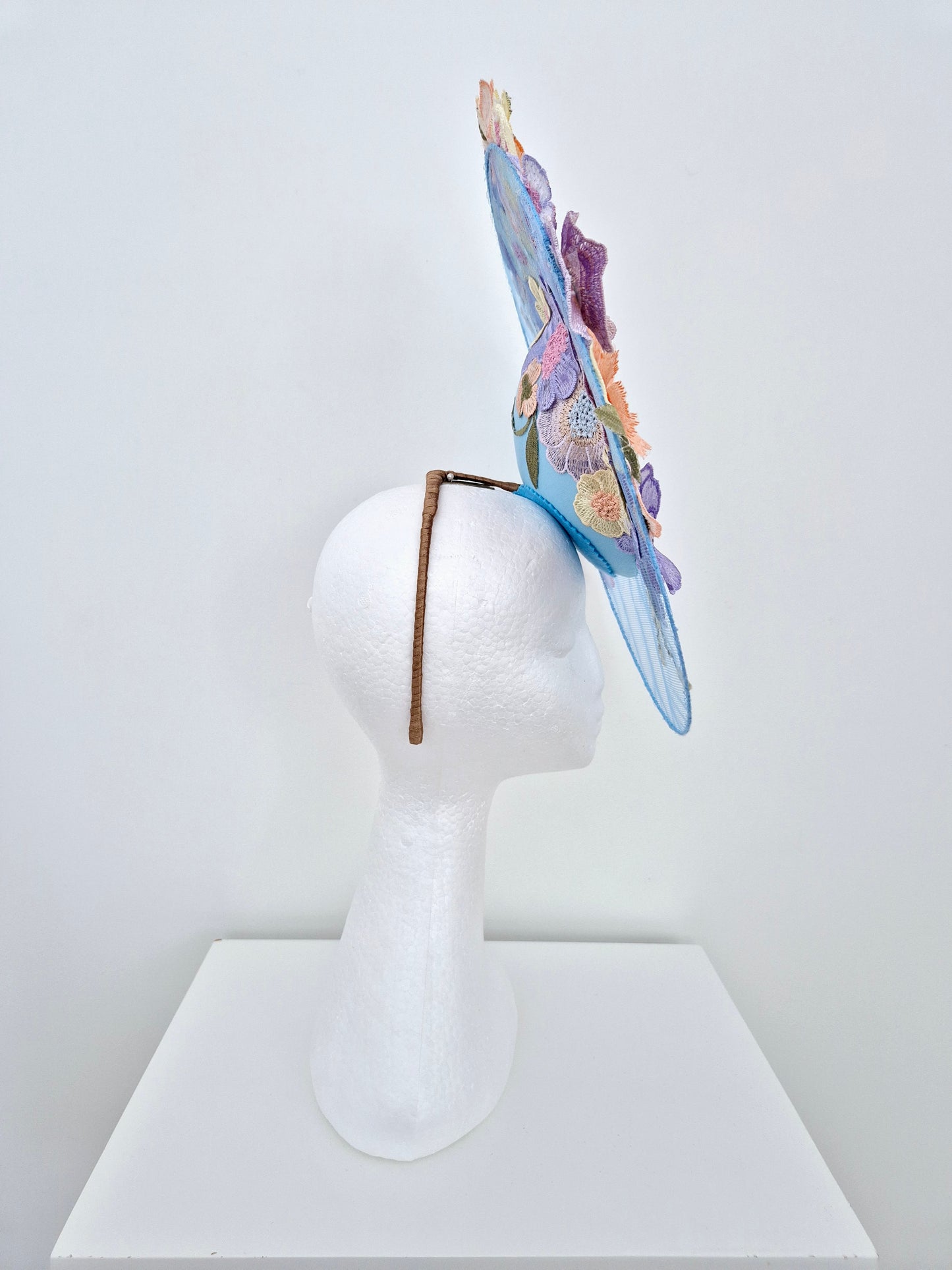 Miss Whimsical. Womens Light Blue satellite percher headband fascinator with pastel multi 3D flowers