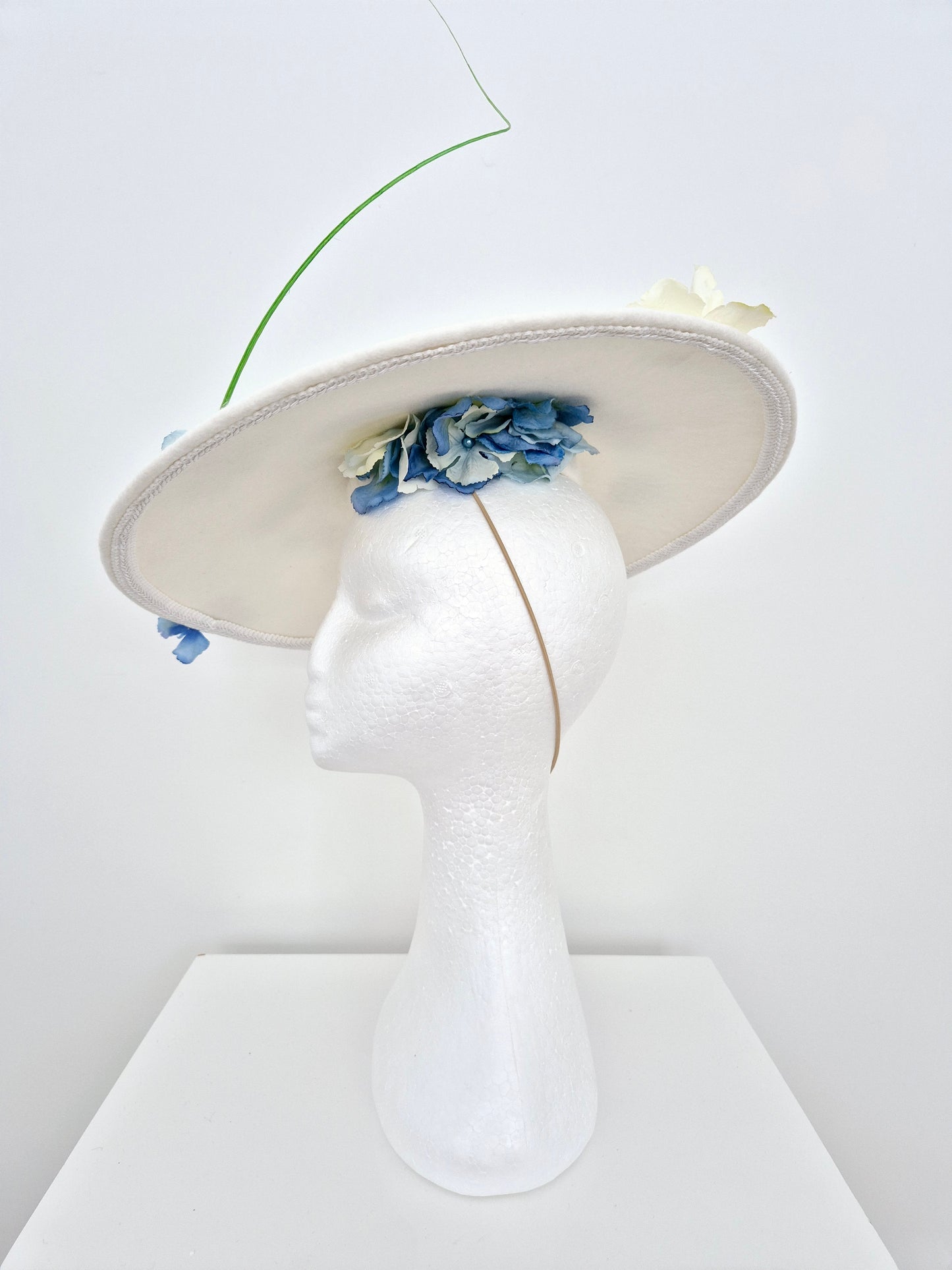 Miss Yvonne. Womens Off white wool felt coolie hat with Blue petals