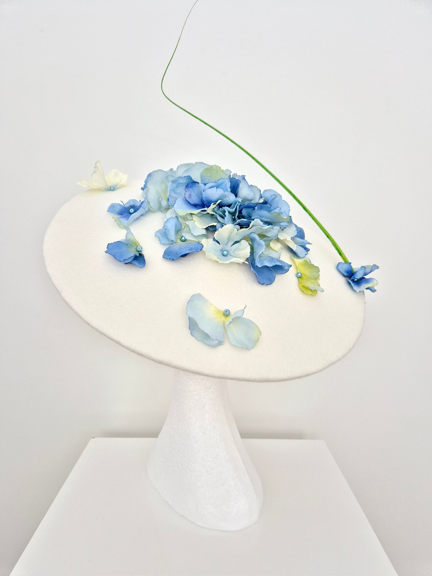 Miss Yvonne. Womens Off white wool felt coolie hat with Blue petals