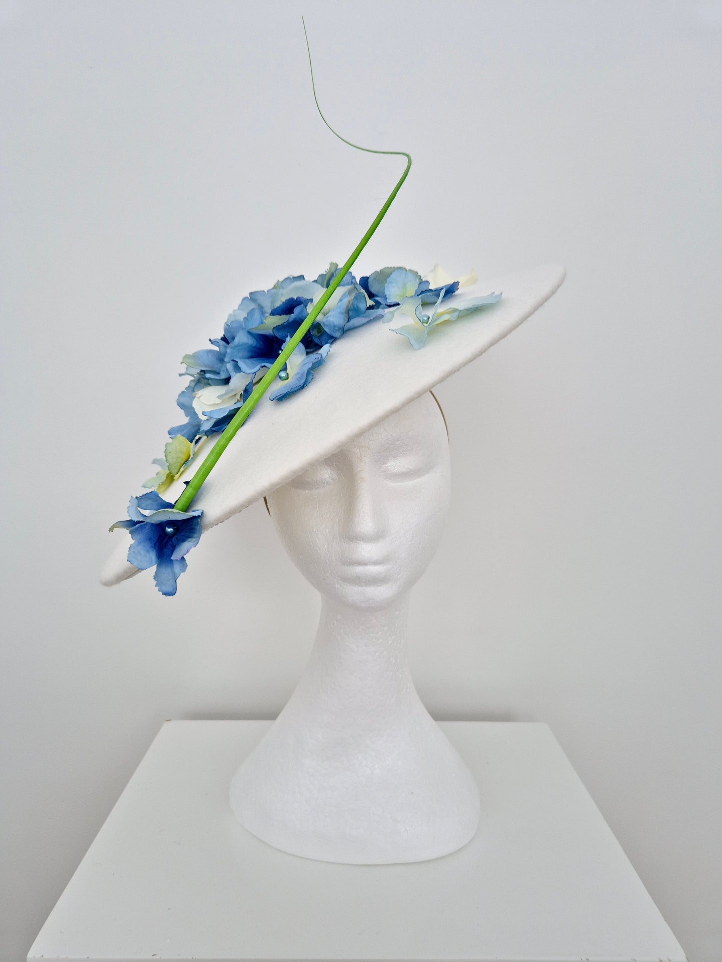 Miss Yvonne. Womens Off white wool felt coolie hat with Blue petals