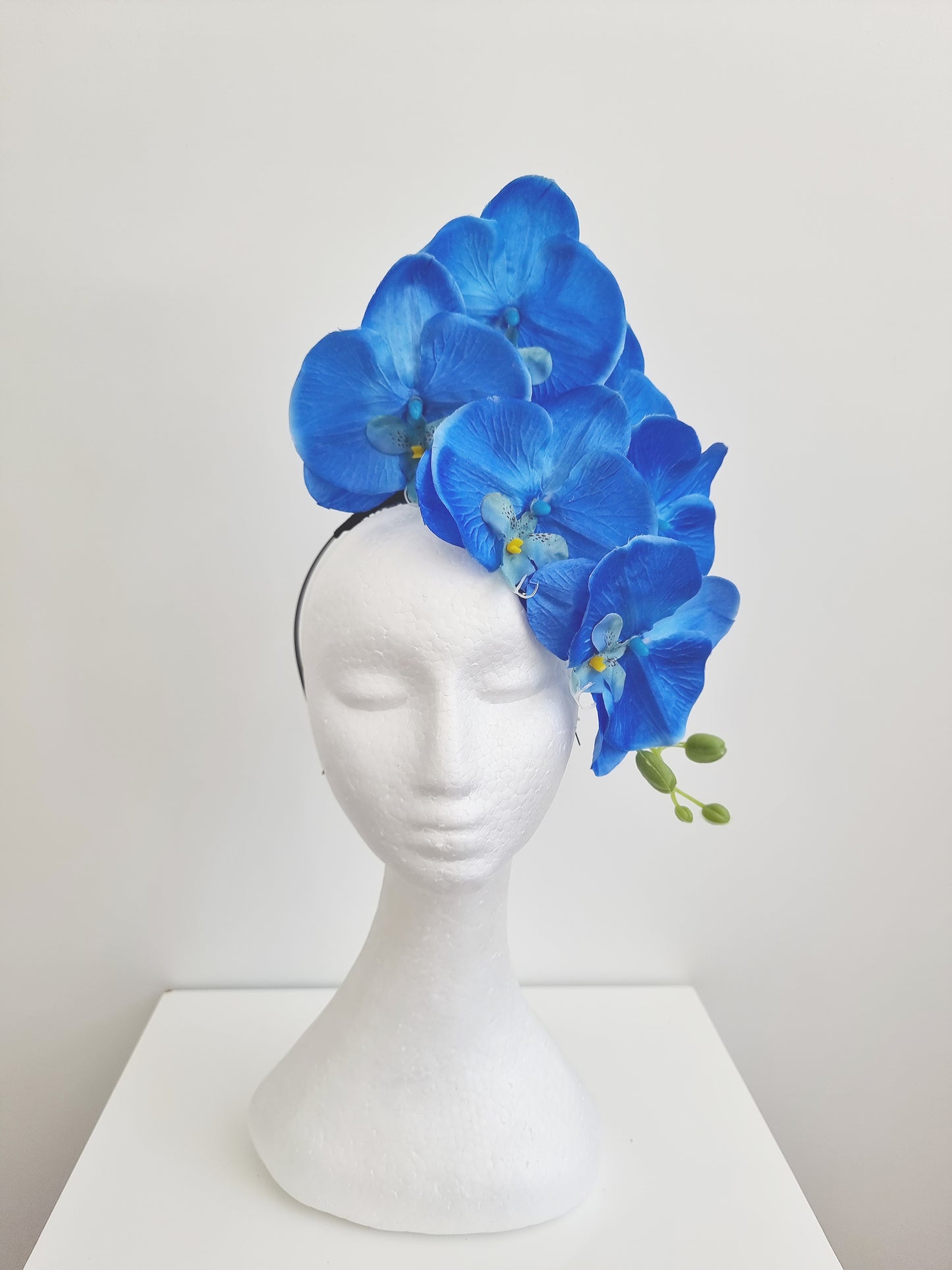 Miss Alexia womens faux orchid flower headband fascinator in Blue tones