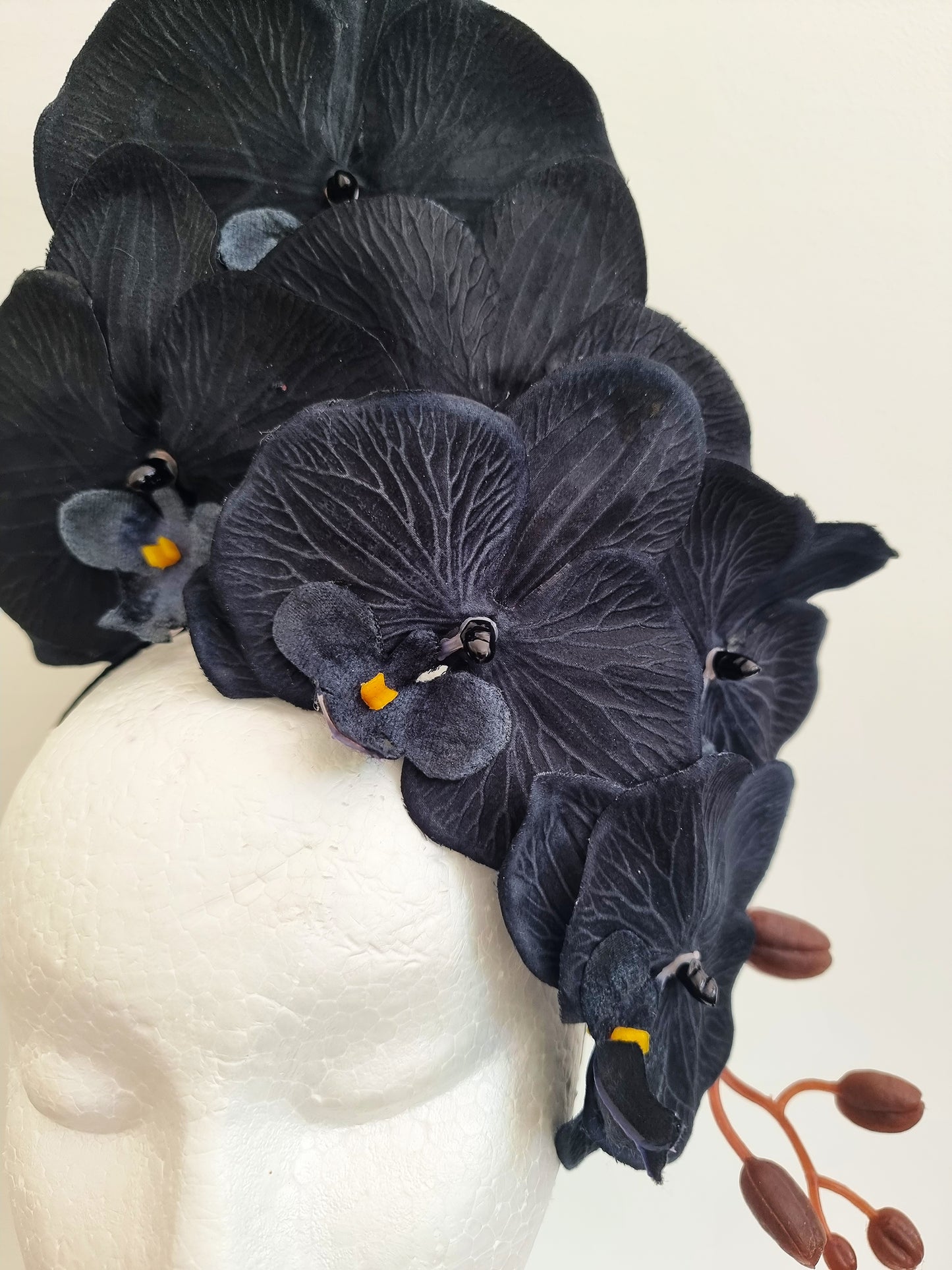 Miss Alexia womens faux orchid flower headband fascinator in Black