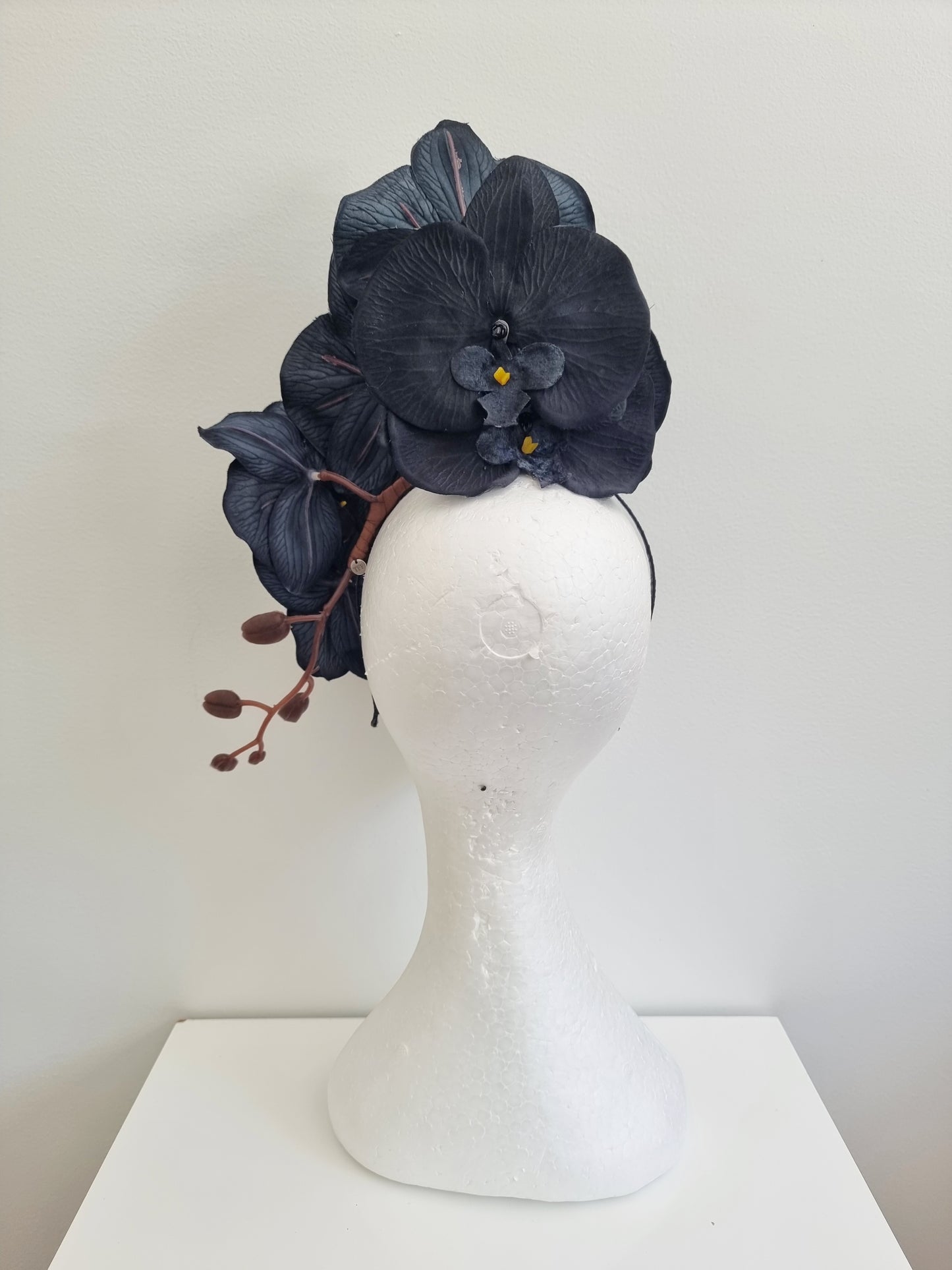 Miss Alexia womens faux orchid flower headband fascinator in Black