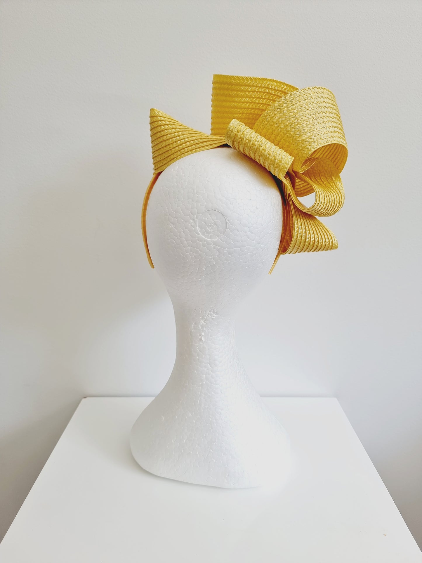 Miss Samantha. Womens braided loop fascinator in Butter yellow