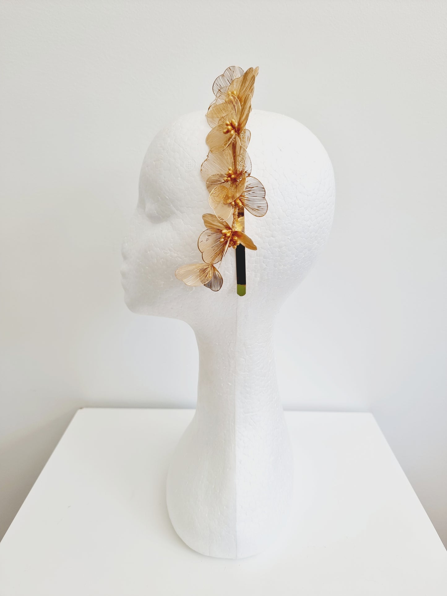 Miss Katie. Womens flower headband fascinator in gold