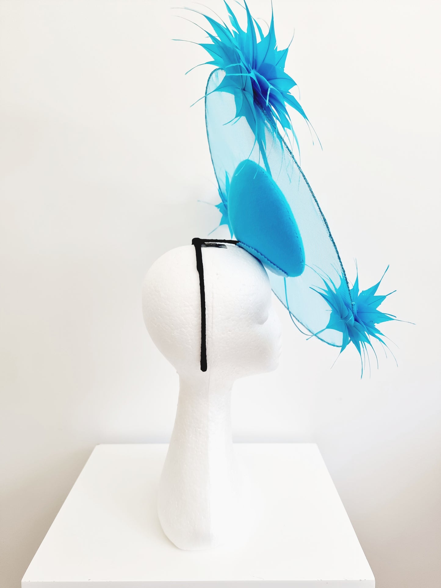 Miss Beckett. Womens Sky Blue satellite percher headband fascinator with flowers