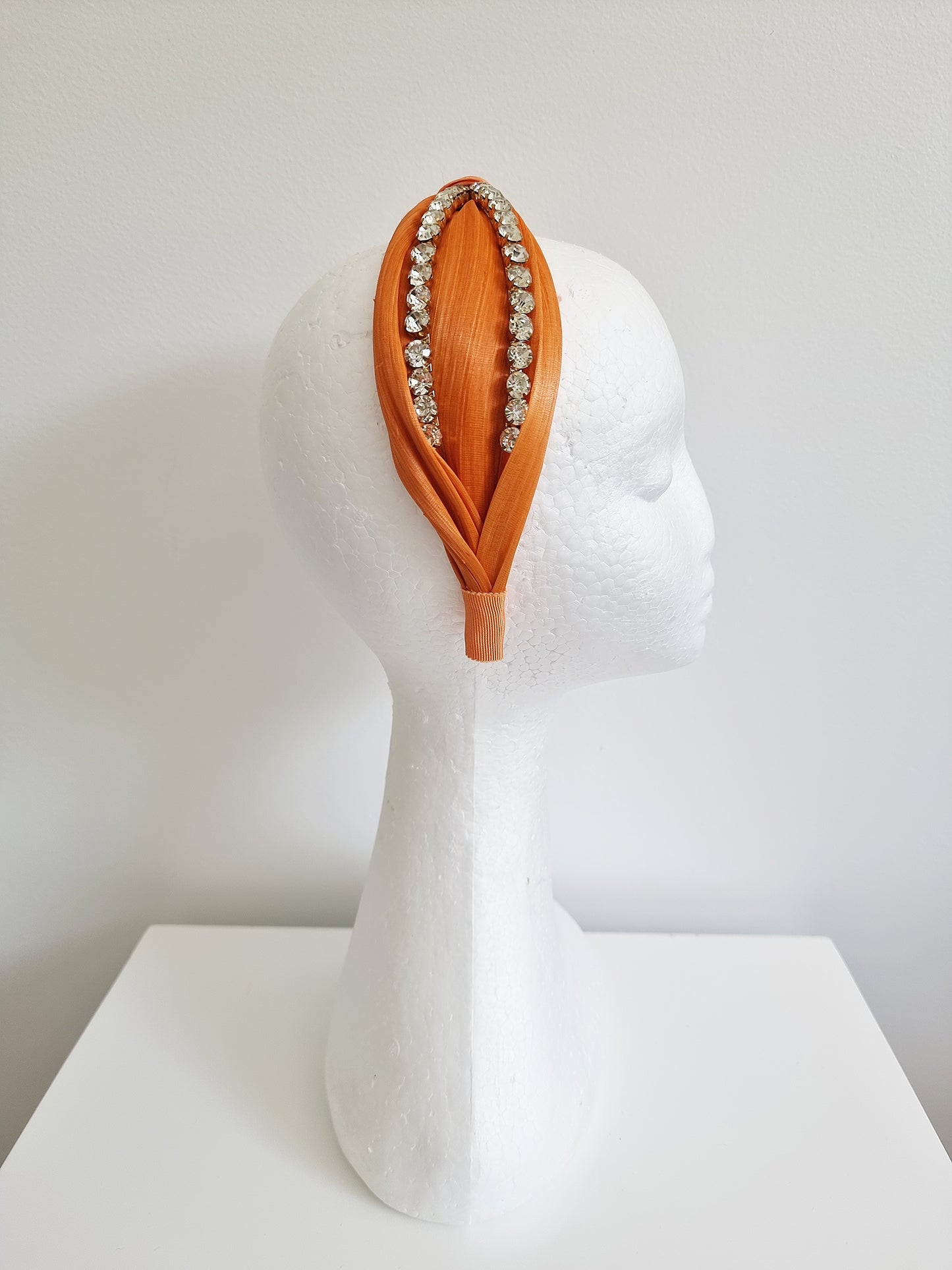 Miss Stella. Womens Orange silk and rhinestone embellished headband