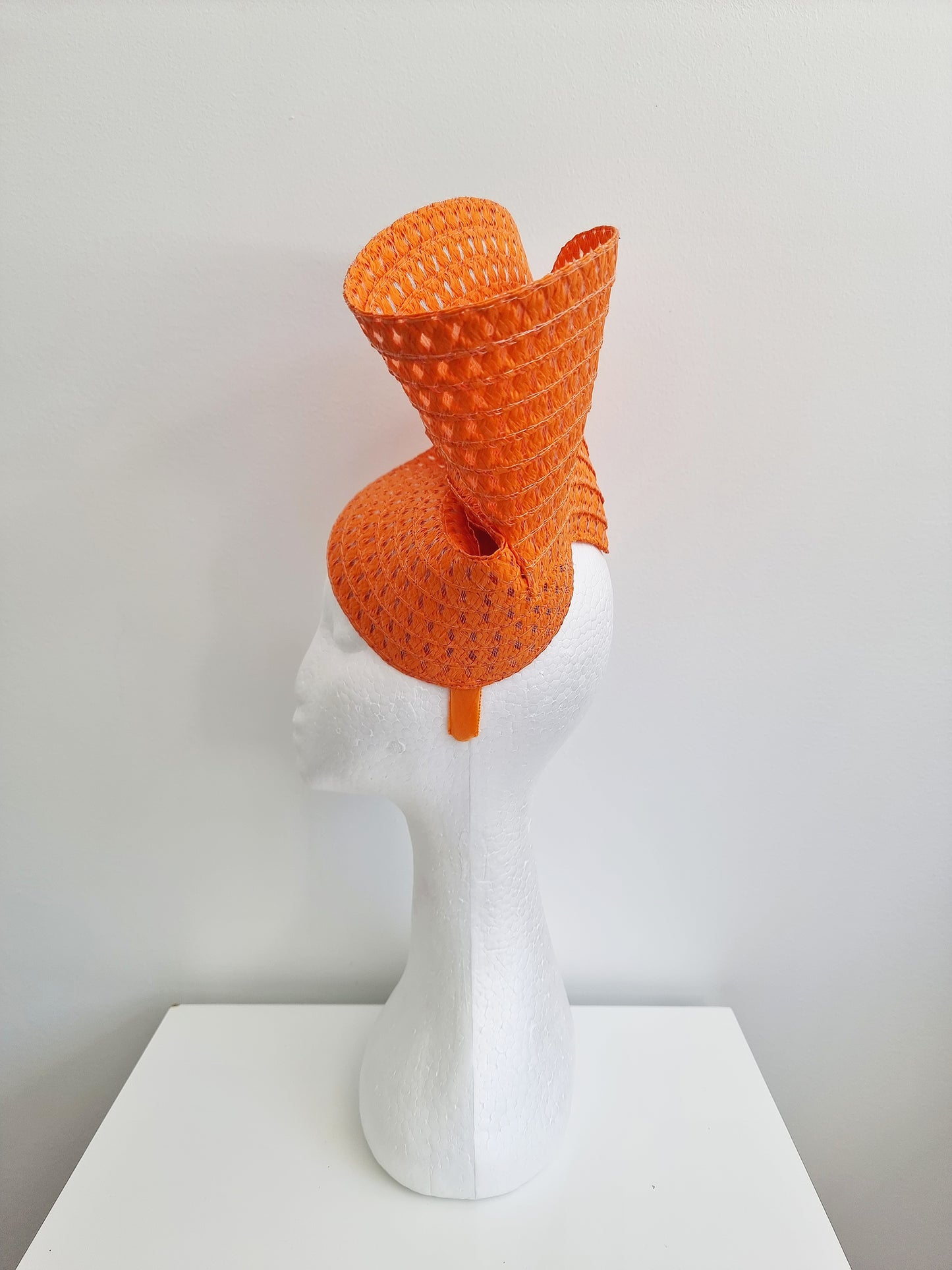 Miss Tara. Womens braided headband fascinator in Orange