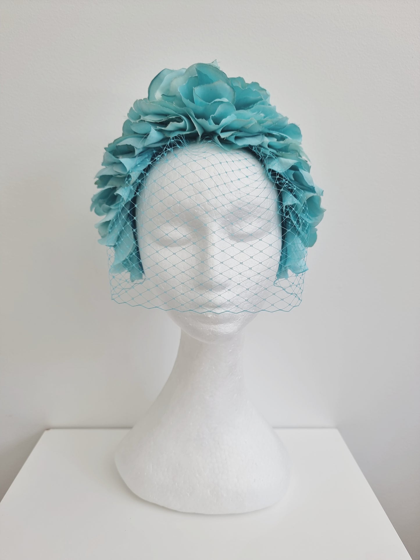 Miss Trixie. Womens ruffle embellished headband with veiling in Tiff Blue
