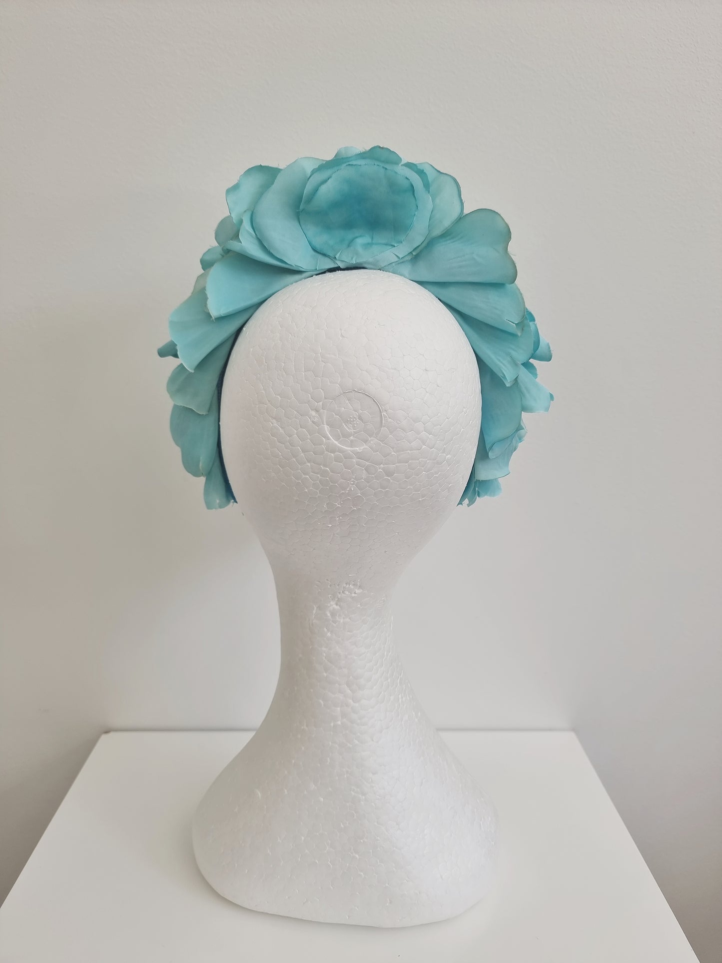 Miss Trixie. Womens ruffle embellished headband with veiling in Tiff Blue