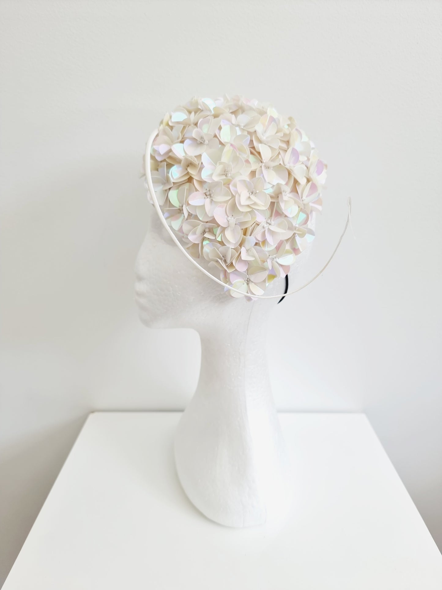 Miss Jamie . Womens Irridescent Ivory 3D flower encrusted fascinator with quill