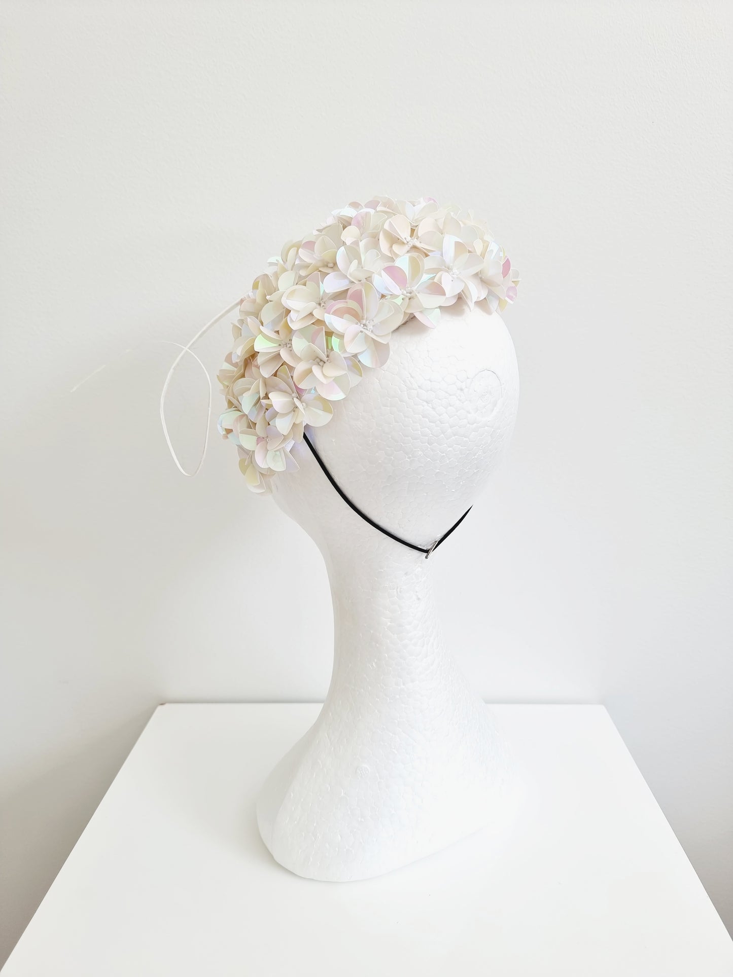 Miss Jamie . Womens Irridescent Ivory 3D flower encrusted fascinator with quill