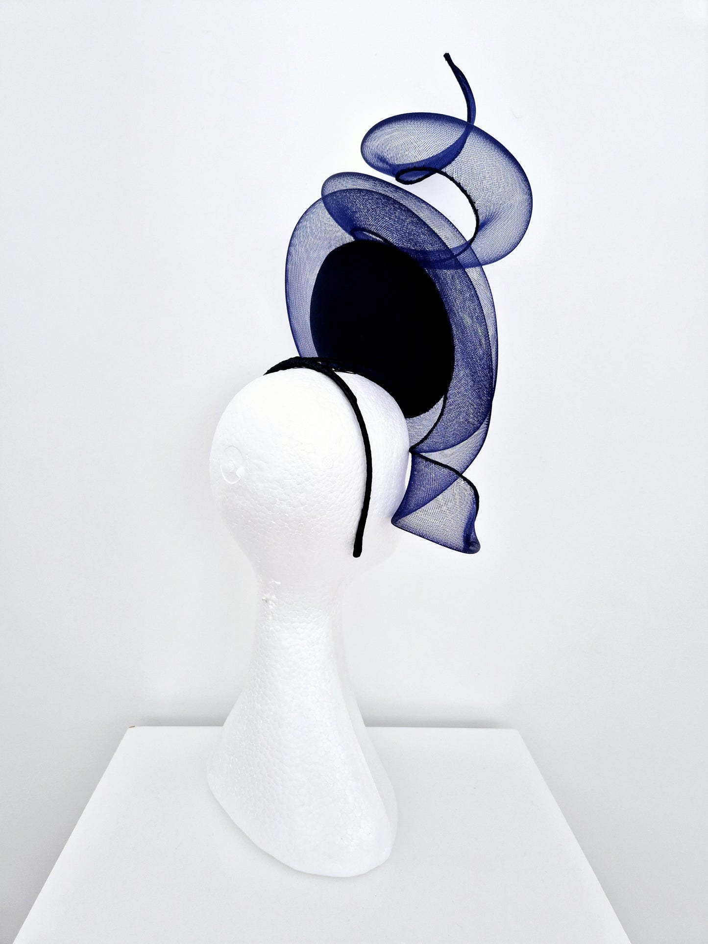 Miss Duke. Womens Navy Blue button percher headband fascinator with crinoline swirl