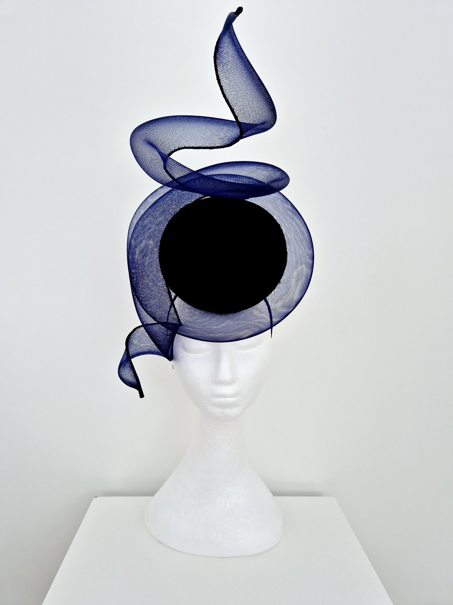 Miss Duke. Womens Navy Blue button percher headband fascinator with crinoline swirl