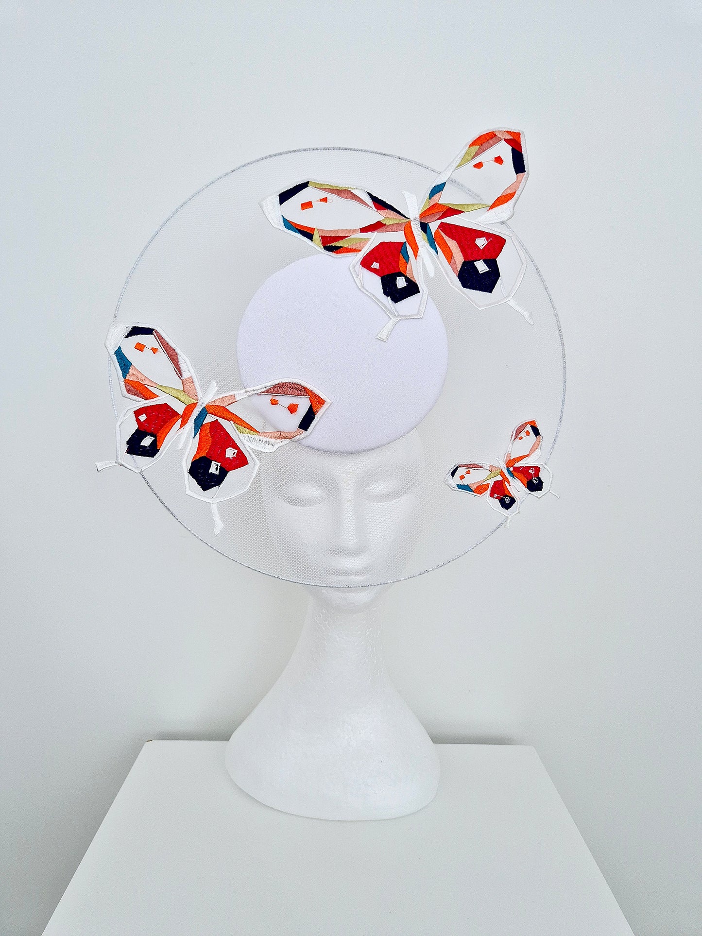 Miss Calista. Womens White satellite percher headpiece with butterflies