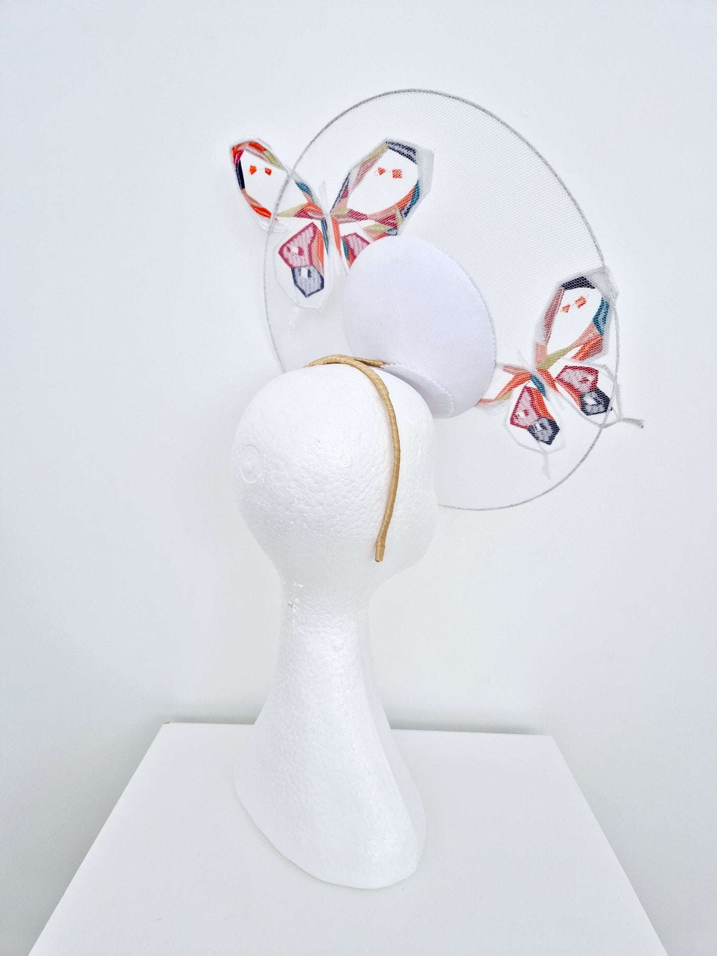 Miss Calista. Womens White satellite percher headpiece with butterflies