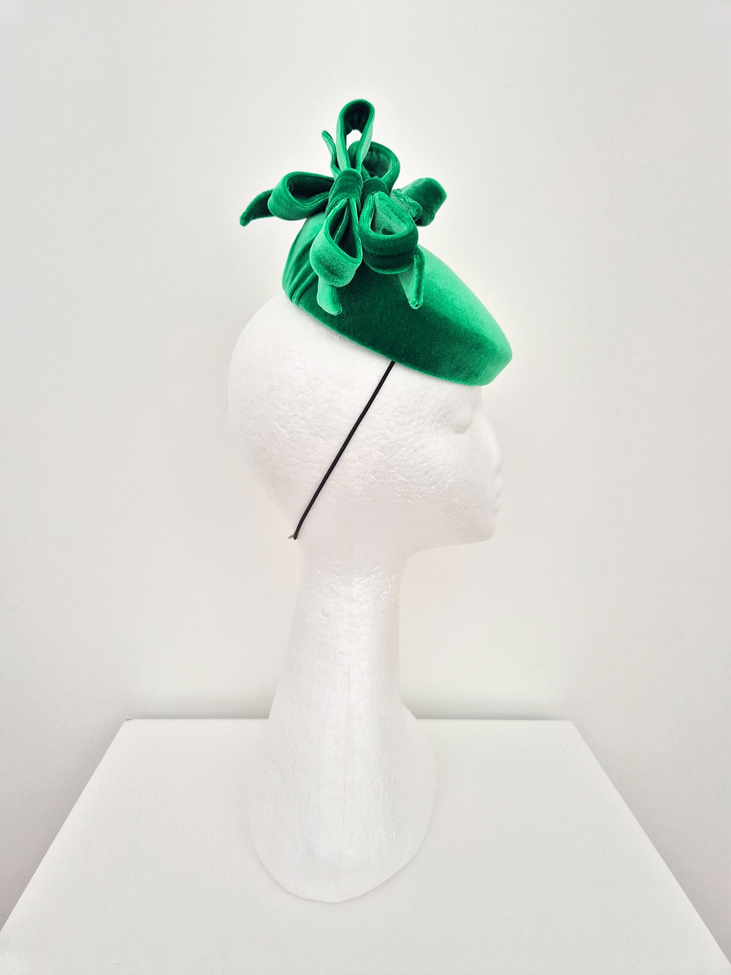 Miss Kesnett . Womens Green velvet slanted pillbox fascinator with bows