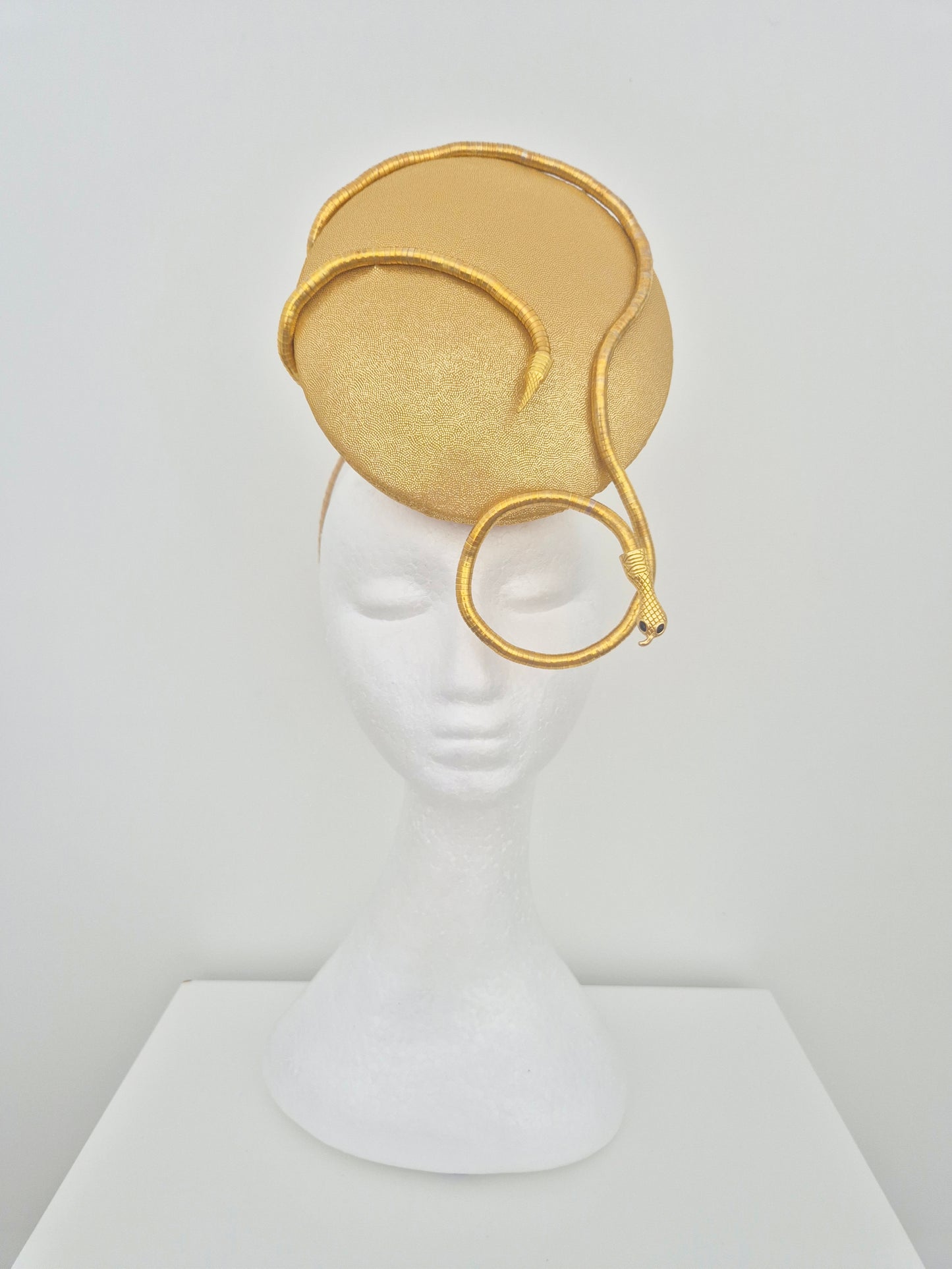 Miss Zendaya. Womens gold button percher headband fascinator with serpent