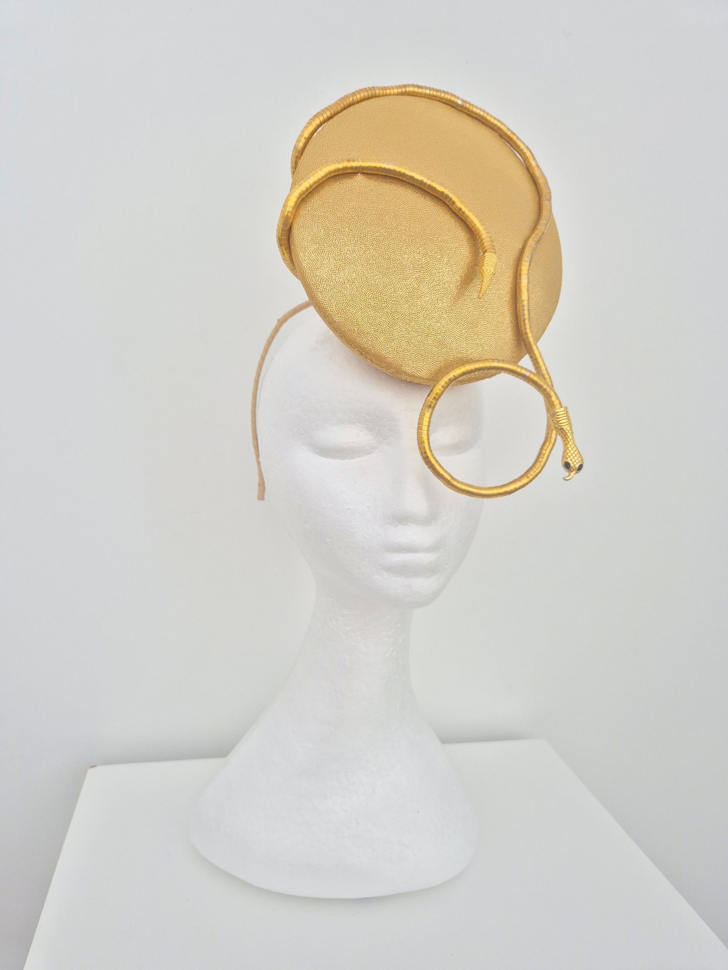 Miss Zendaya. Womens gold button percher headband fascinator with serpent