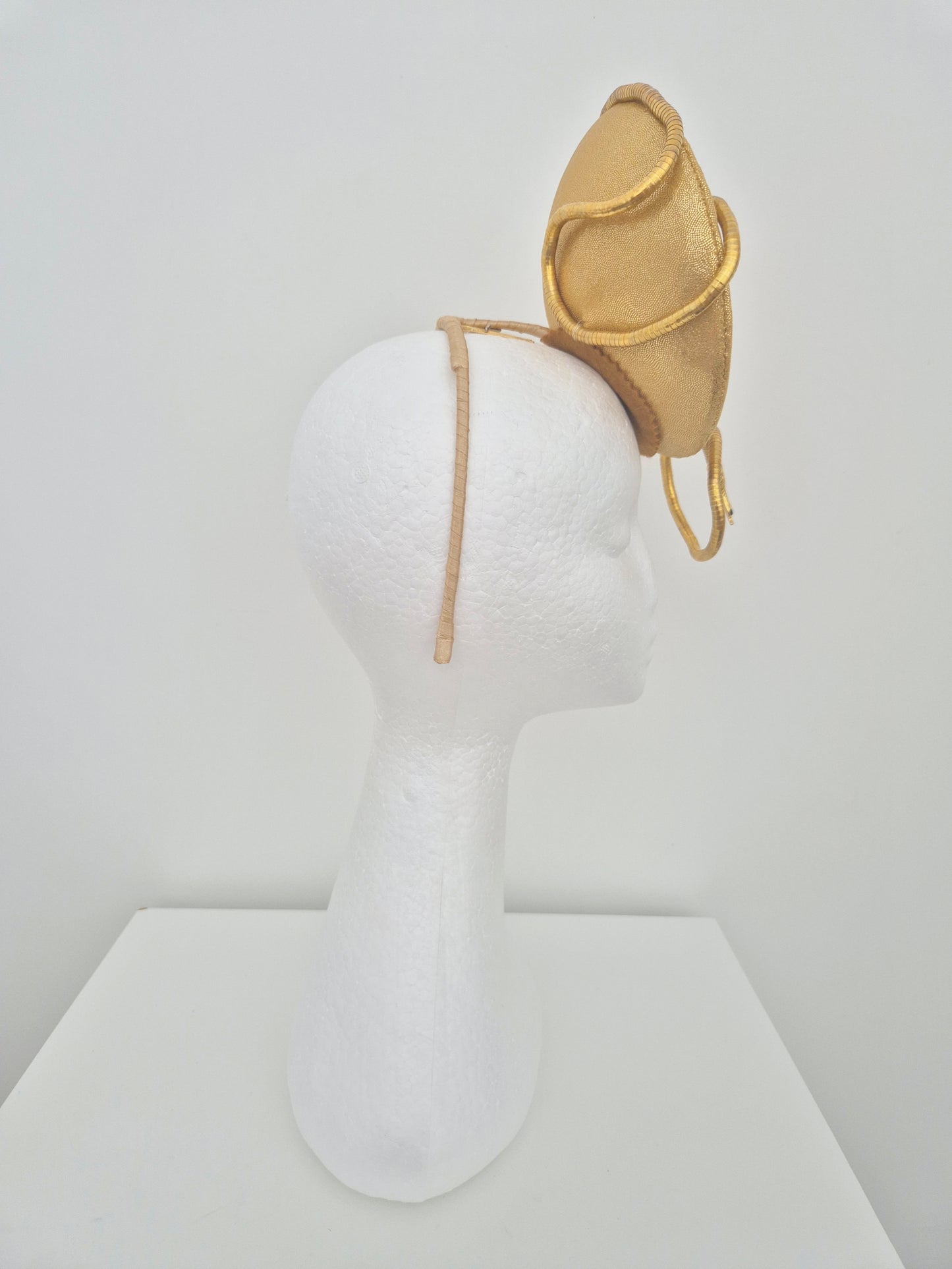 Miss Zendaya. Womens gold button percher headband fascinator with serpent