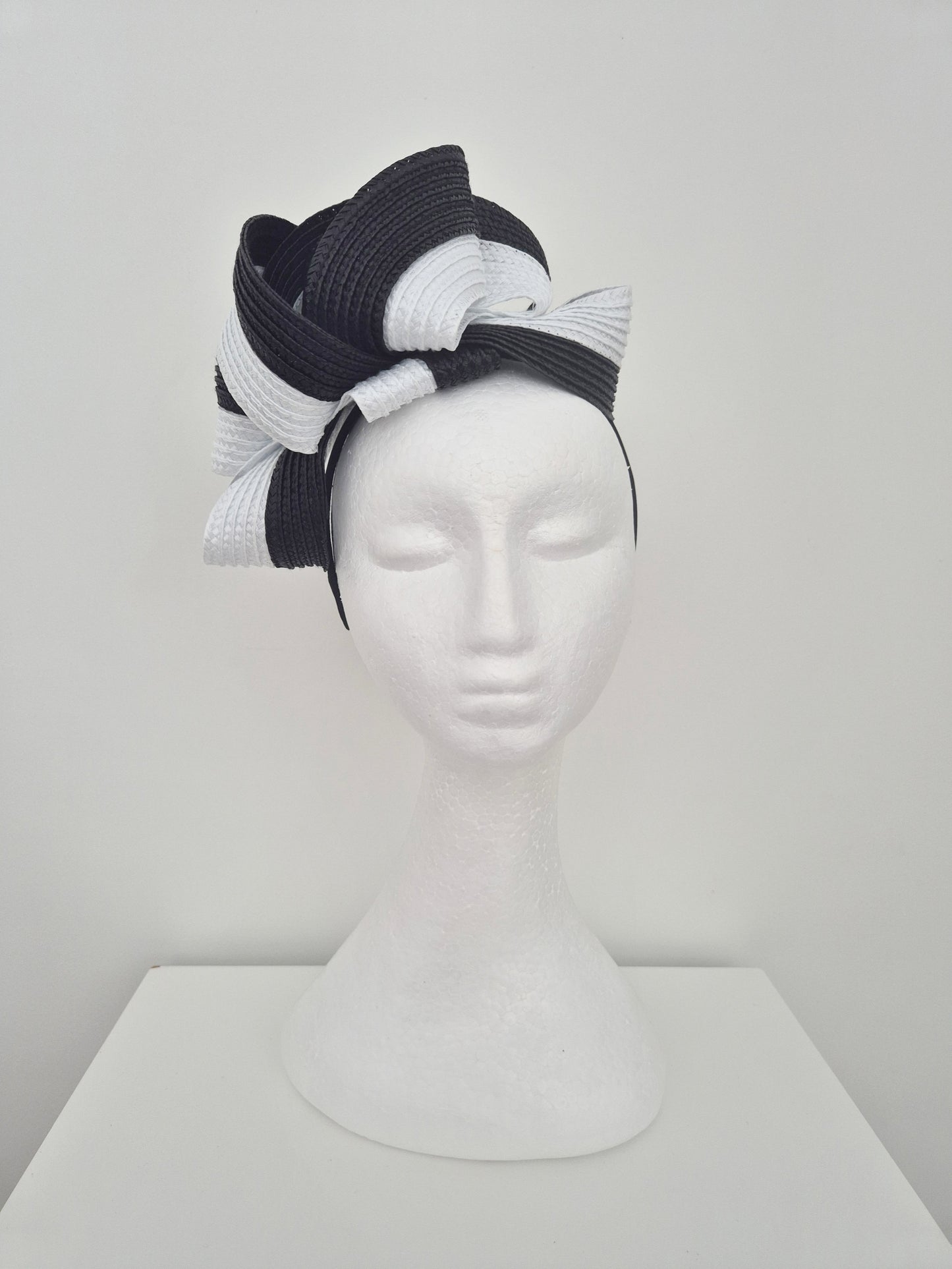 Miss Samantha. Womens braided loop fascinator in Black and White