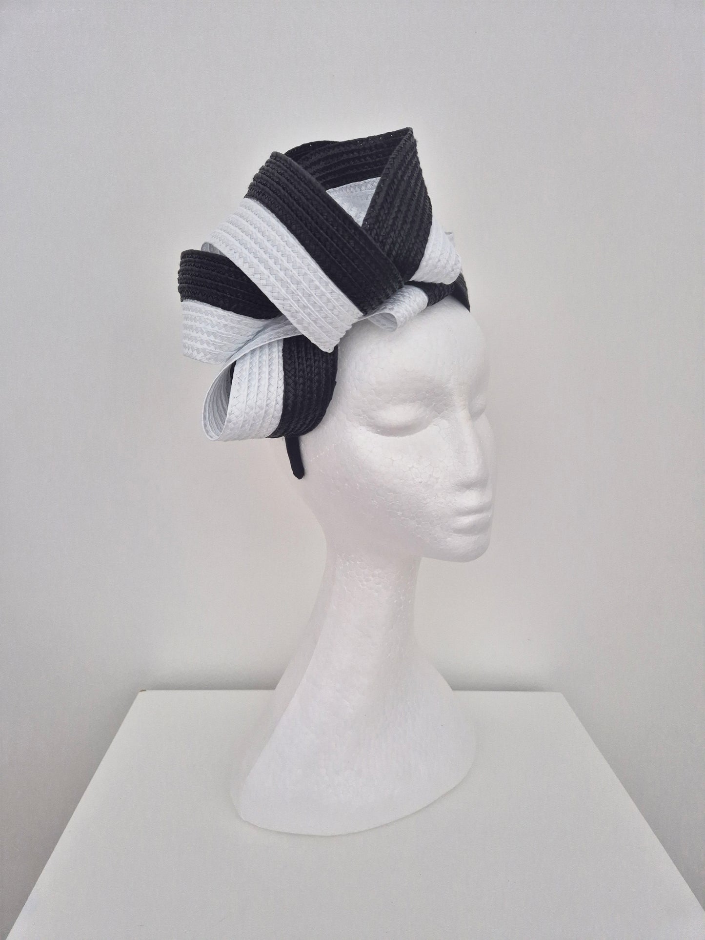 Miss Samantha. Womens braided loop fascinator in Black and White