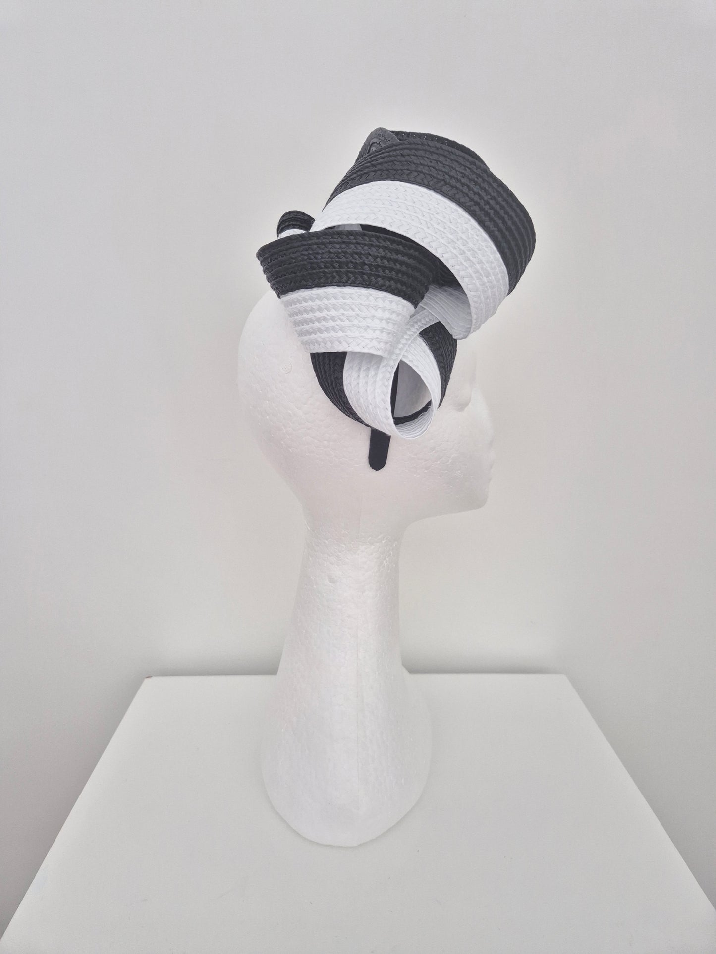 Miss Samantha. Womens braided loop fascinator in Black and White