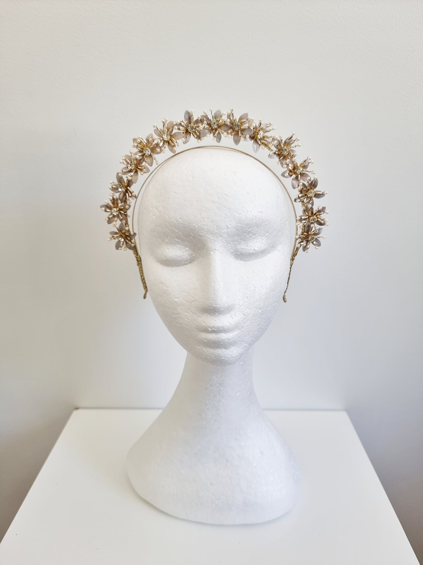 Miss Kiara. Womens flower headband fascinator in gold